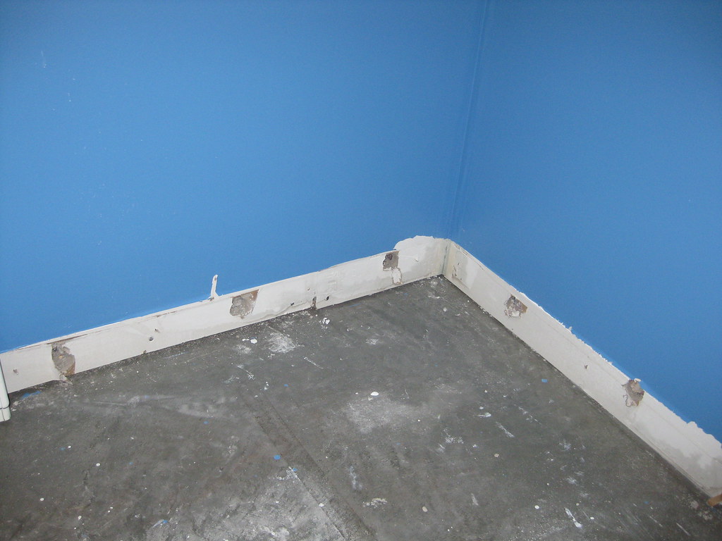 Water-damaged wall from a hidden leak, the kind of escape of water a trace and access insurance claim covers